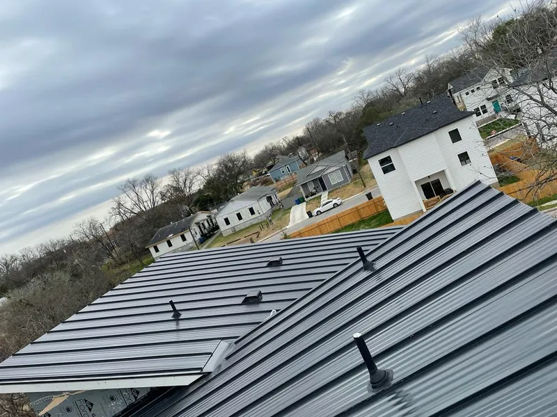 Standing seam metal roof panels with vents for Skylight Repair in Breckenridge